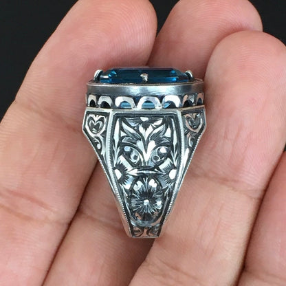 Zyan Gems | Exclusively Designed Ring with AAA Cut Octagonal Blue Topaz |  Sterling Silver Oxidized Hand-engraved Ring