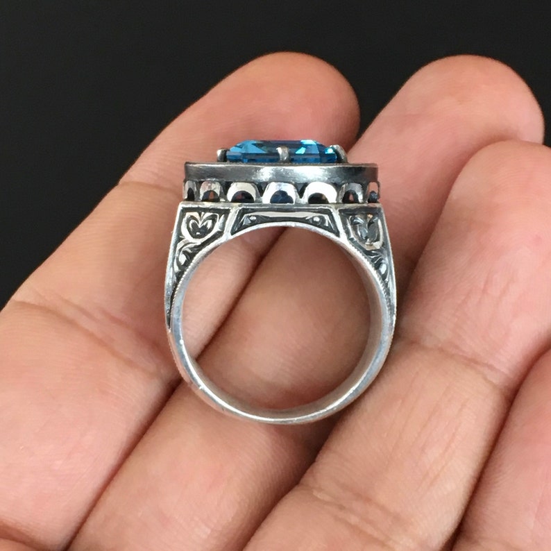 Zyan Gems | Exclusively Designed Ring with AAA Cut Octagonal Blue Topaz |  Sterling Silver Oxidized Hand-engraved Ring