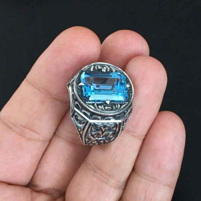 Zyan Gems | Exclusively Designed Ring with AAA Cut Octagonal Blue Topaz |  Sterling Silver Oxidized Hand-engraved Ring