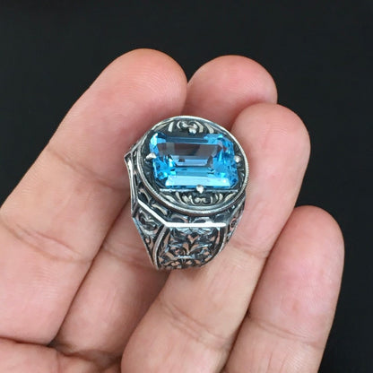 Zyan Gems | Exclusively Designed Ring with AAA Cut Octagonal Blue Topaz |  Sterling Silver Oxidized Hand-engraved Ring