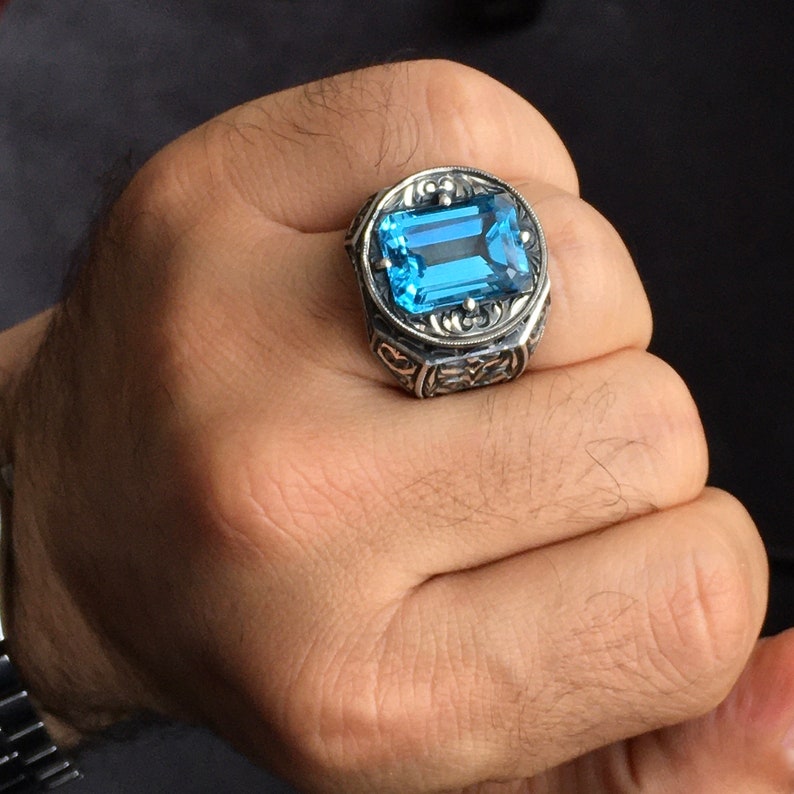 Zyan Gems | Exclusively Designed Ring with AAA Cut Octagonal Blue Topaz |  Sterling Silver Oxidized Hand-engraved Ring