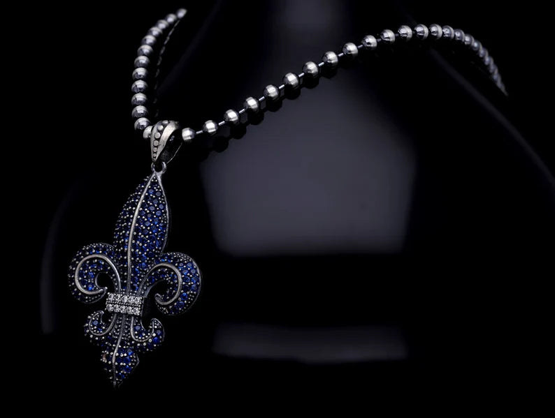 Zyan Gems | Unique Designed Fleur-De-Lis Pendant Studded with Blue Zircons for Men |  Sterling Silver Oxidized Pendant